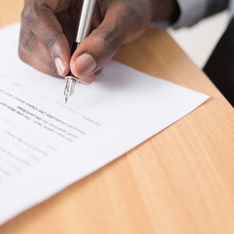 Billing specialist reviewing and correcting a denied claim form
